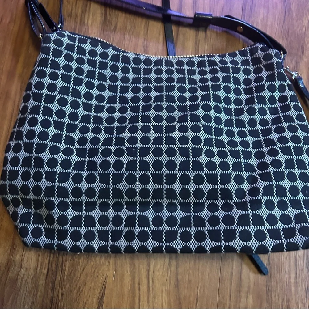 Kate Spade Penn Place Keisha crossbody bag in a black and white dot pattern
